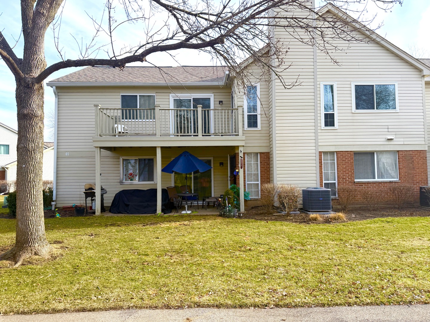 1410 Tulip Court, Unit D2 Wheeling, IL 60090 - Photo 17 of 30 a view of house with outdoor space