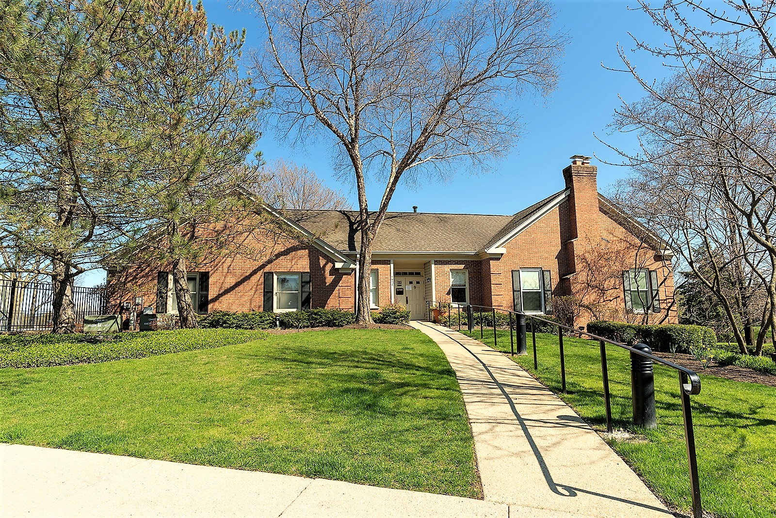 1410 Tulip Court, Unit D2 Wheeling, IL 60090 - Photo 26 of 30 a view of a house with a yard