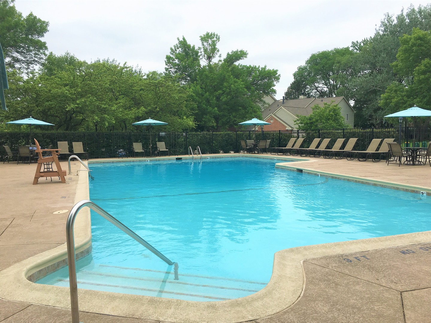 1410 Tulip Court, Unit D2 Wheeling, IL 60090 - Photo 27 of 30 a view of a swimming pool with a patio