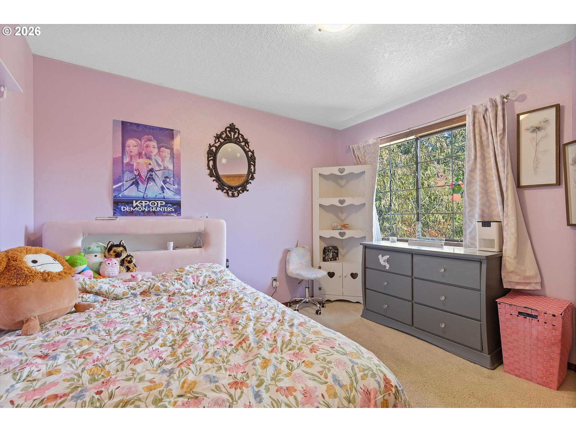 7655 Ridgewood Drive Gladstone, OR 97027 - Photo 14 of 27 a bedroom with a bed and wooden floor