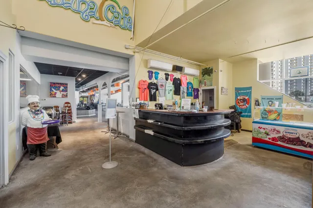 a room with lots of furniture and clutter