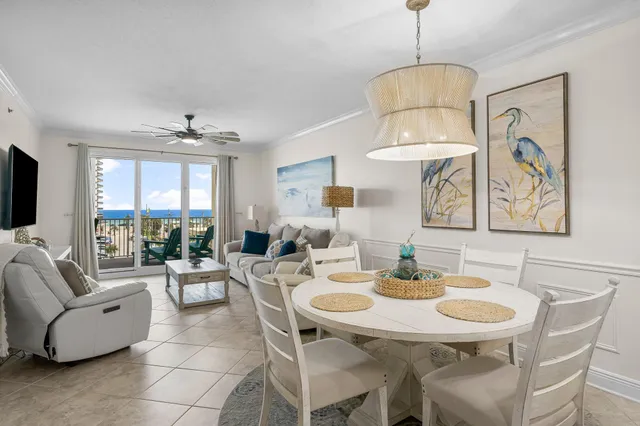 a view of a dining room with furniture window and outside view
