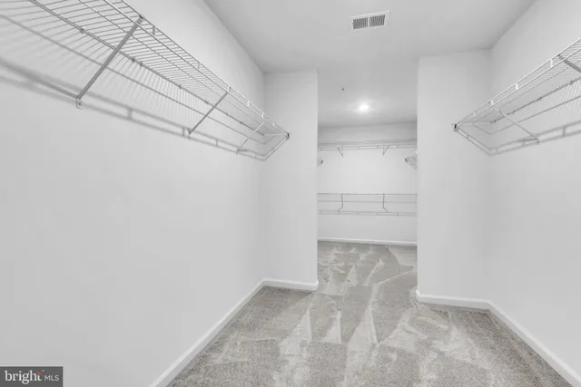 a view of a room with racks on the wall