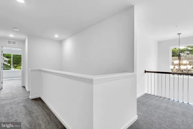 a view of hallway with stairs