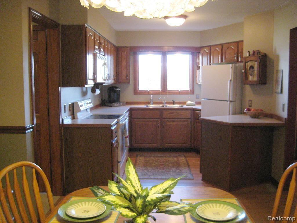 15205 Donald Road Capac, MI 48014 - Photo 8 of 22 #8 Dining Room and Kitchen.jpg