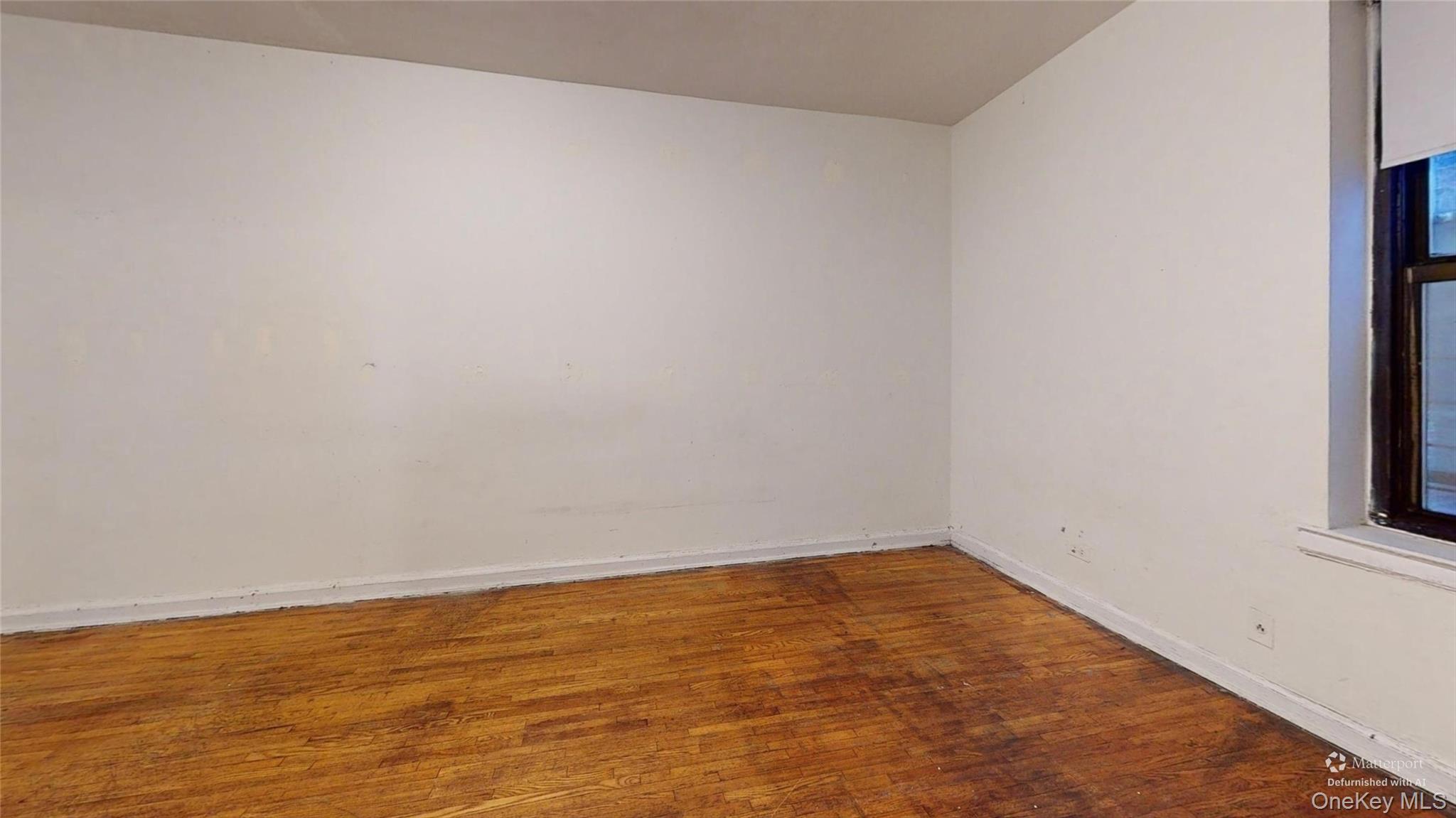 123-35 82nd Road, Unit 3Q Queens, NY 11415 - Photo 10 of 15 a view of an empty room