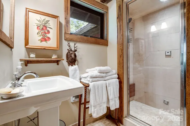 a bathroom with a sink and mirror