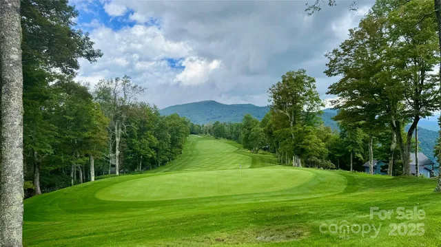 a view of a golf course with a garden