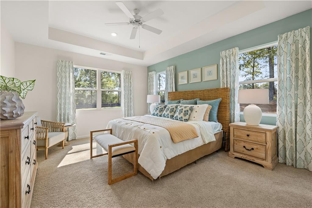 1160 Amerson Street Buckhead, GA 30625 - Photo 23 of 48 a spacious bedroom with a bed and a window