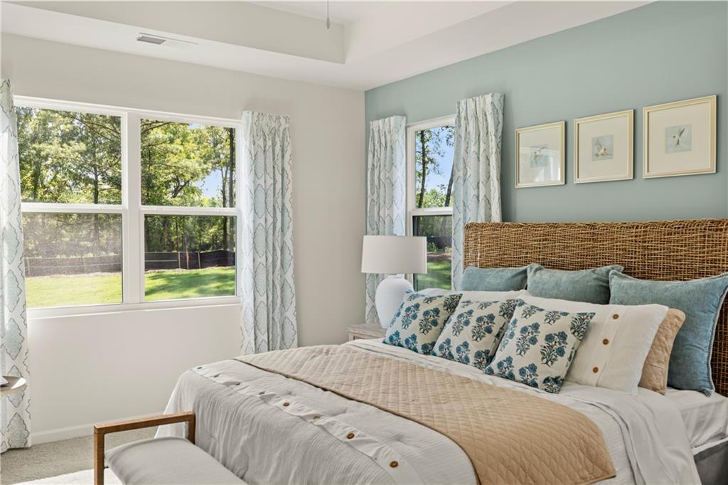 1160 Amerson Street Buckhead, GA 30625 - Photo 24 of 48 a bedroom with a bed and a window