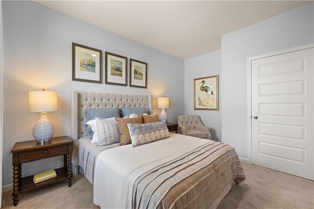 1160 Amerson Street Buckhead, GA 30625 - Photo 41 of 48 a bedroom with a bed and a lamp on the dresser