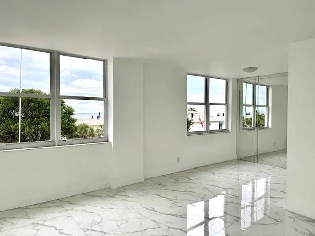 a view of a window in an empty room