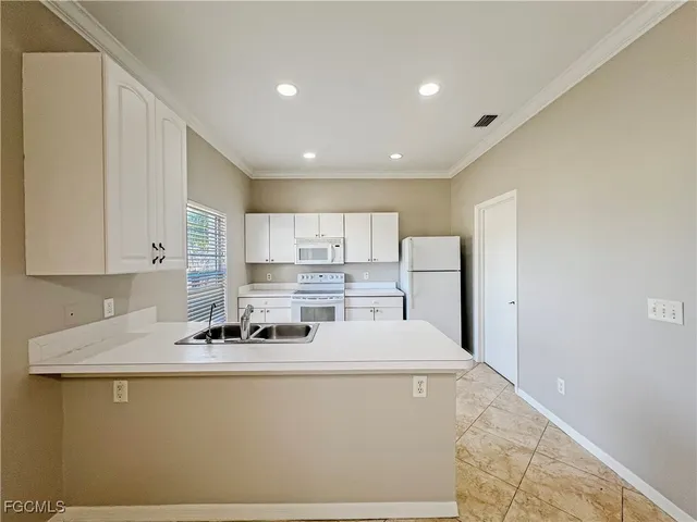 $1,799 | 906 Alfreda Avenue, Lehigh Acres, FL 33971