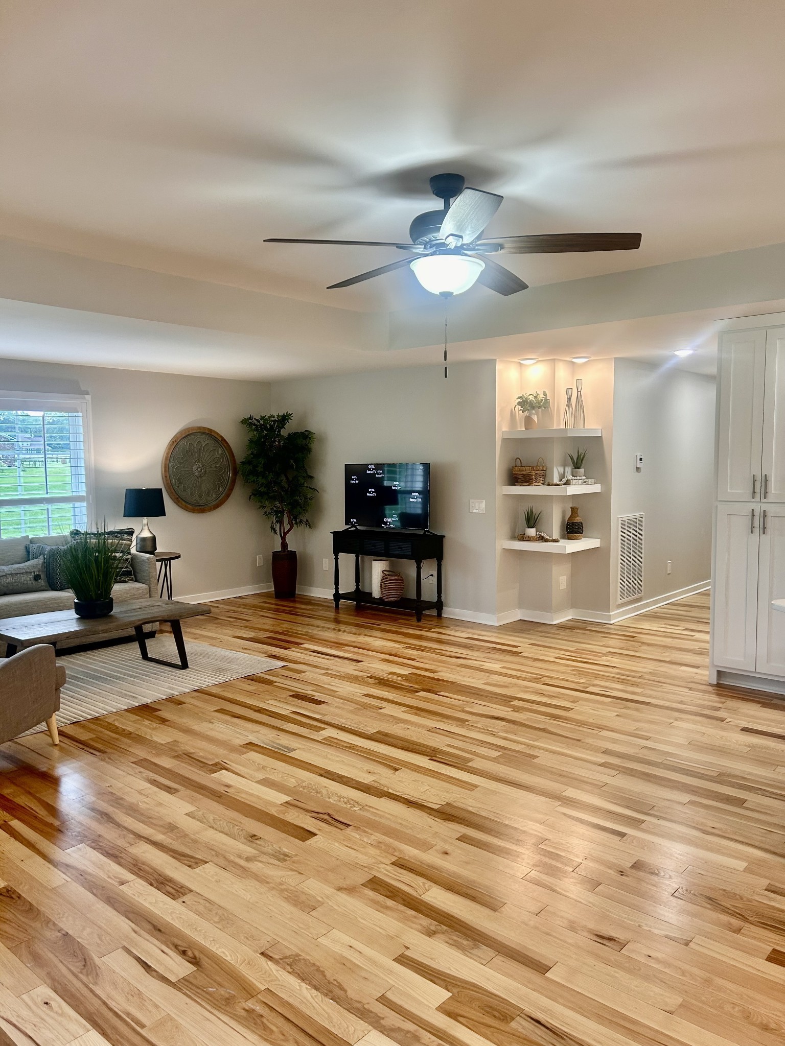 1059 South Cross Bridges Road Mount Pleasant, TN 38474 - Photo 14 of 53 a living room with furniture and a wooden floor