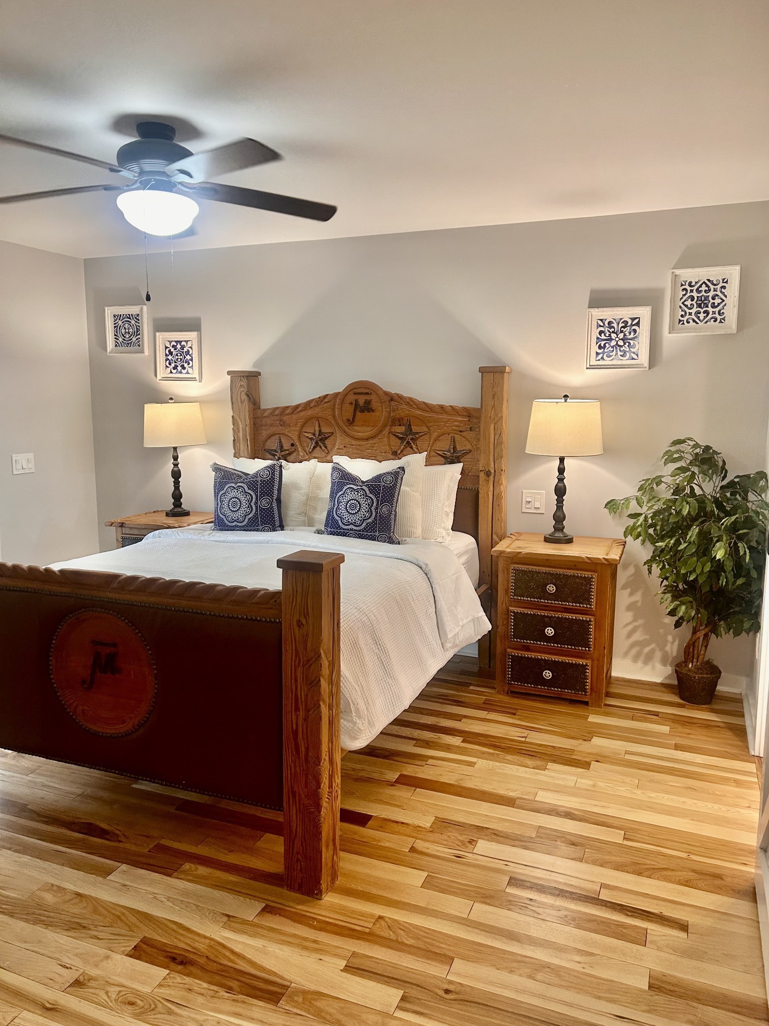 1059 South Cross Bridges Road Mount Pleasant, TN 38474 - Photo 15 of 53 a bedroom with a bed and a potted plant