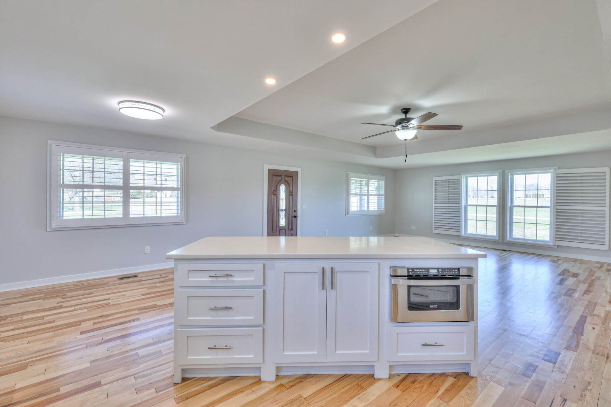 1059 South Cross Bridges Road Mount Pleasant, TN 38474 - Photo 28 of 53 a kitchen with a stove cabinets and wooden floor