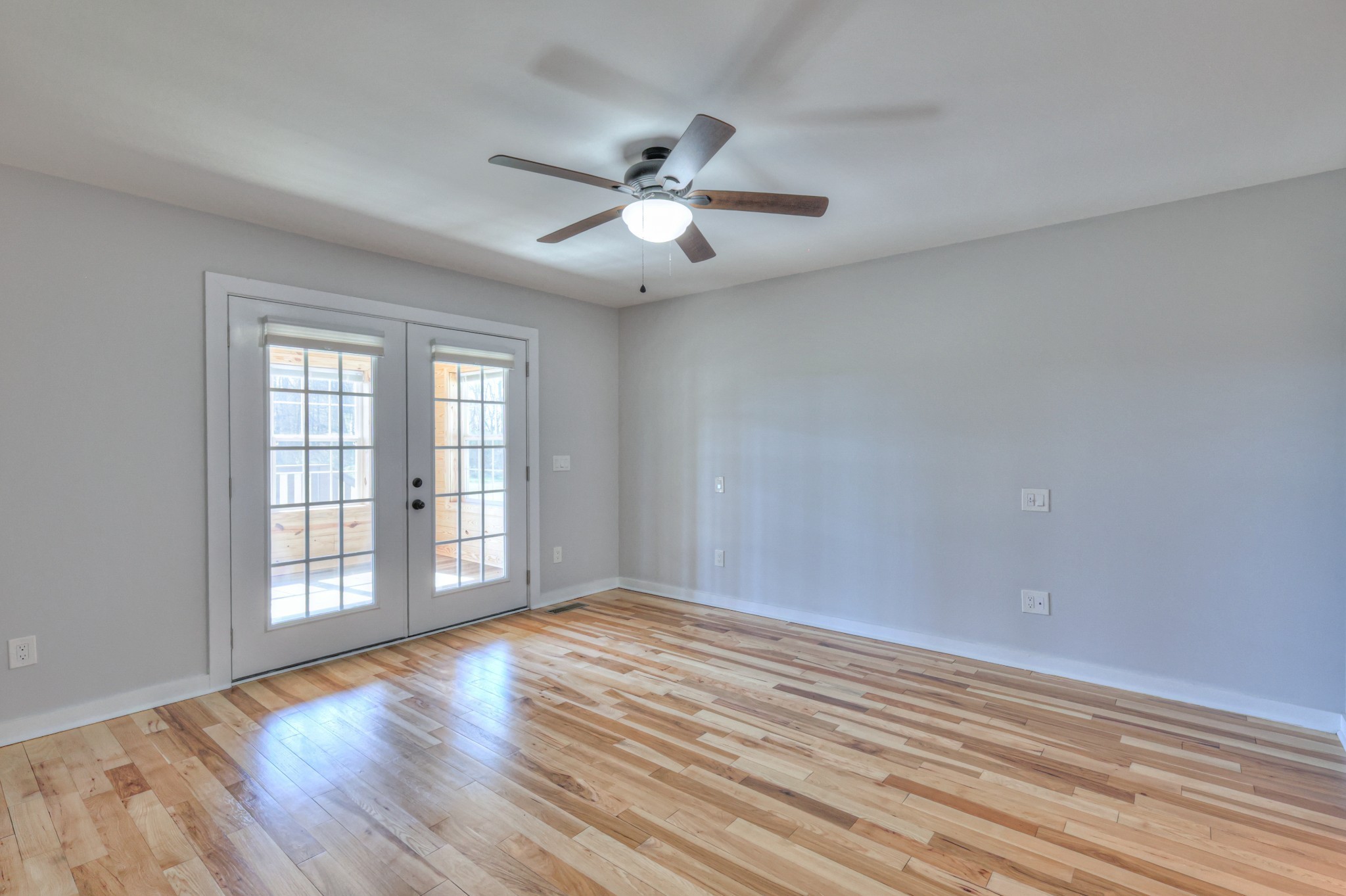 1059 South Cross Bridges Road Mount Pleasant, TN 38474 - Photo 35 of 53 wooden floor in an empty room with a window