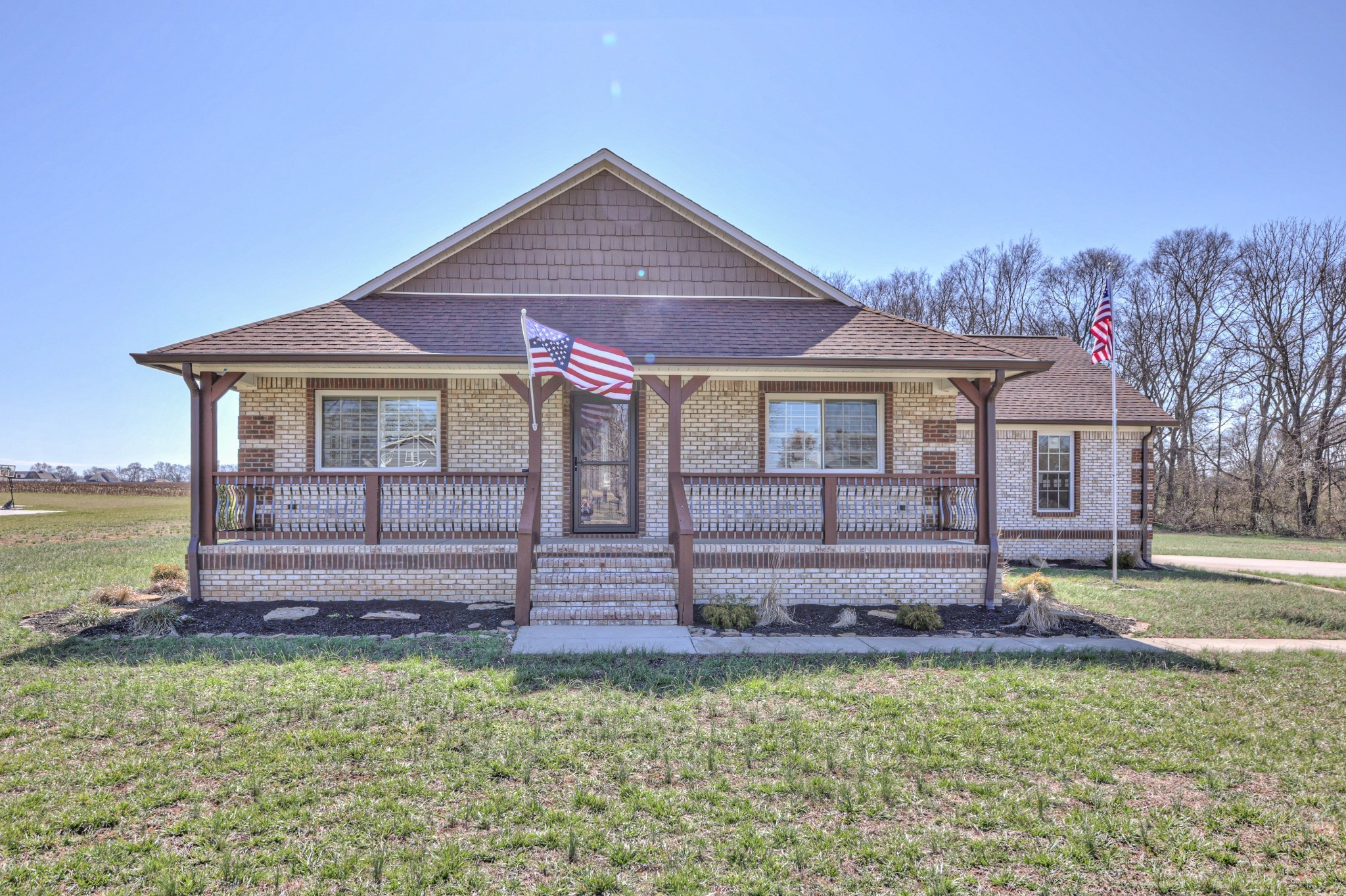 1059 South Cross Bridges Road Mount Pleasant, TN 38474 - Photo 4 of 53 a front view of a house with a yard