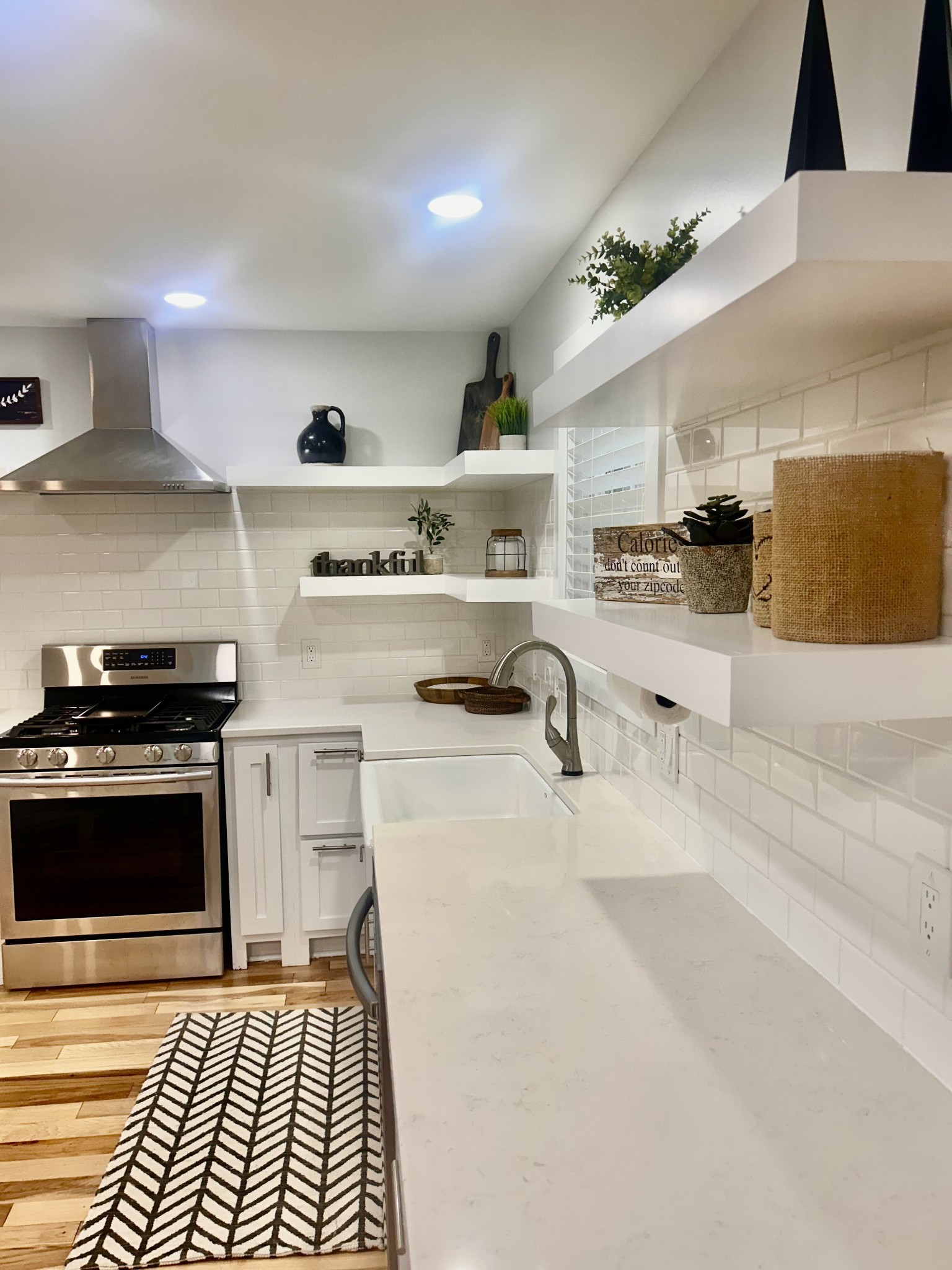 1059 South Cross Bridges Road Mount Pleasant, TN 38474 - Photo 6 of 53 a kitchen with stainless steel appliances granite countertop a stove and a sink