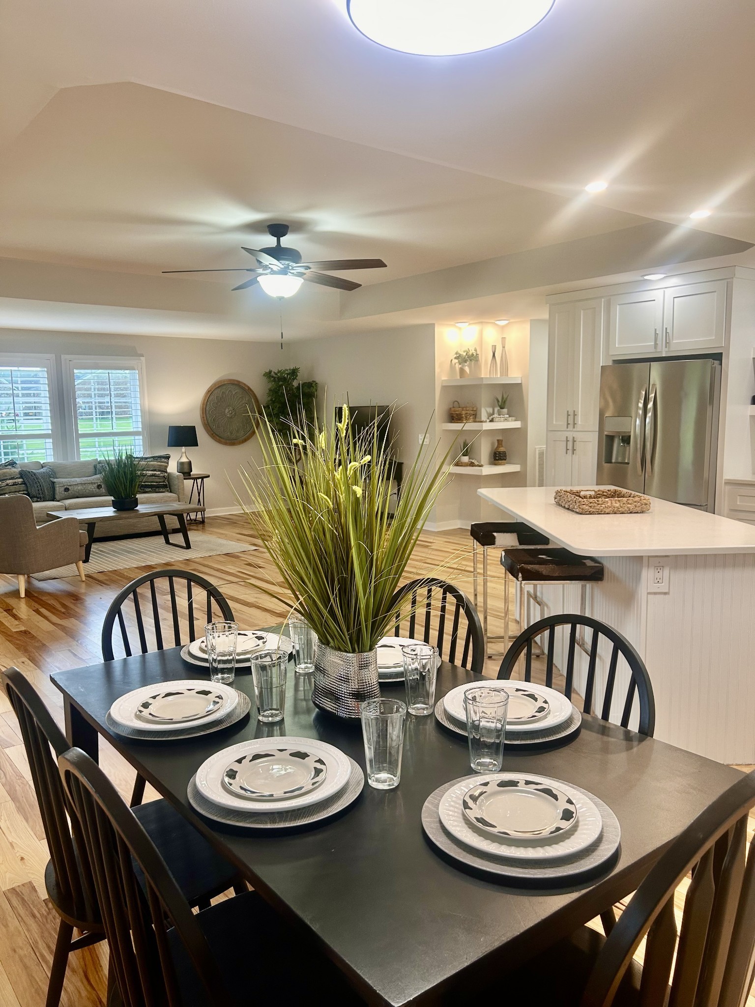 1059 South Cross Bridges Road Mount Pleasant, TN 38474 - Photo 9 of 53 a kitchen with a table and chairs in it
