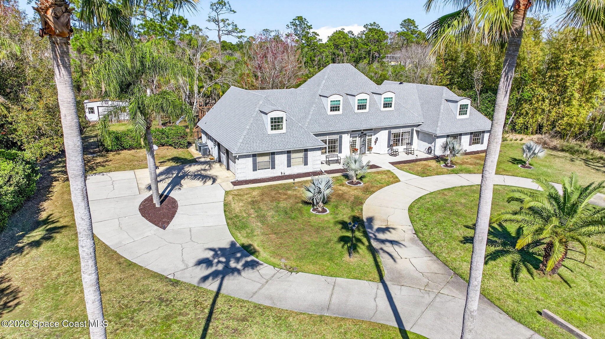 3854 Rambling Acres Drive Titusville, FL 32796 - Photo 5 of 96 DJI_20260127142129_0001_D