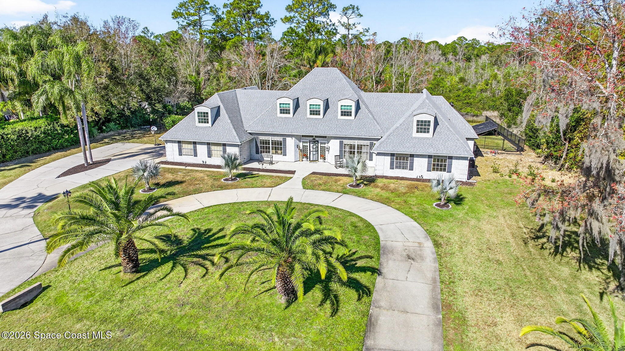 3854 Rambling Acres Drive Titusville, FL 32796 - Photo 80 of 96 DJI_20260127142148_0007_D