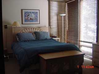 4444 Streamside Circle Vail, CO 81657 - Photo 8 of 8 a view of a bedroom with a bench