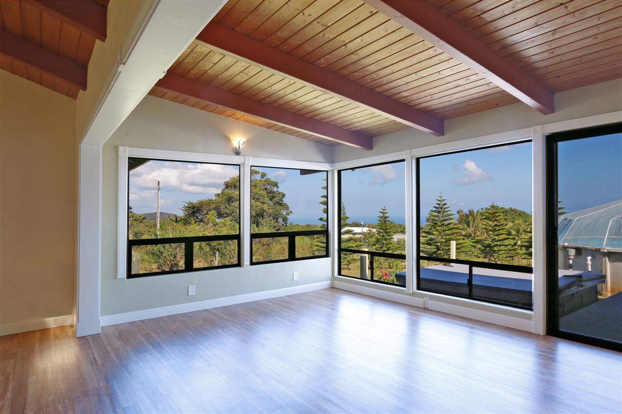 71 Awalau Road Haiku, HI 96708 - Photo 4 of 30 an empty room with large windows