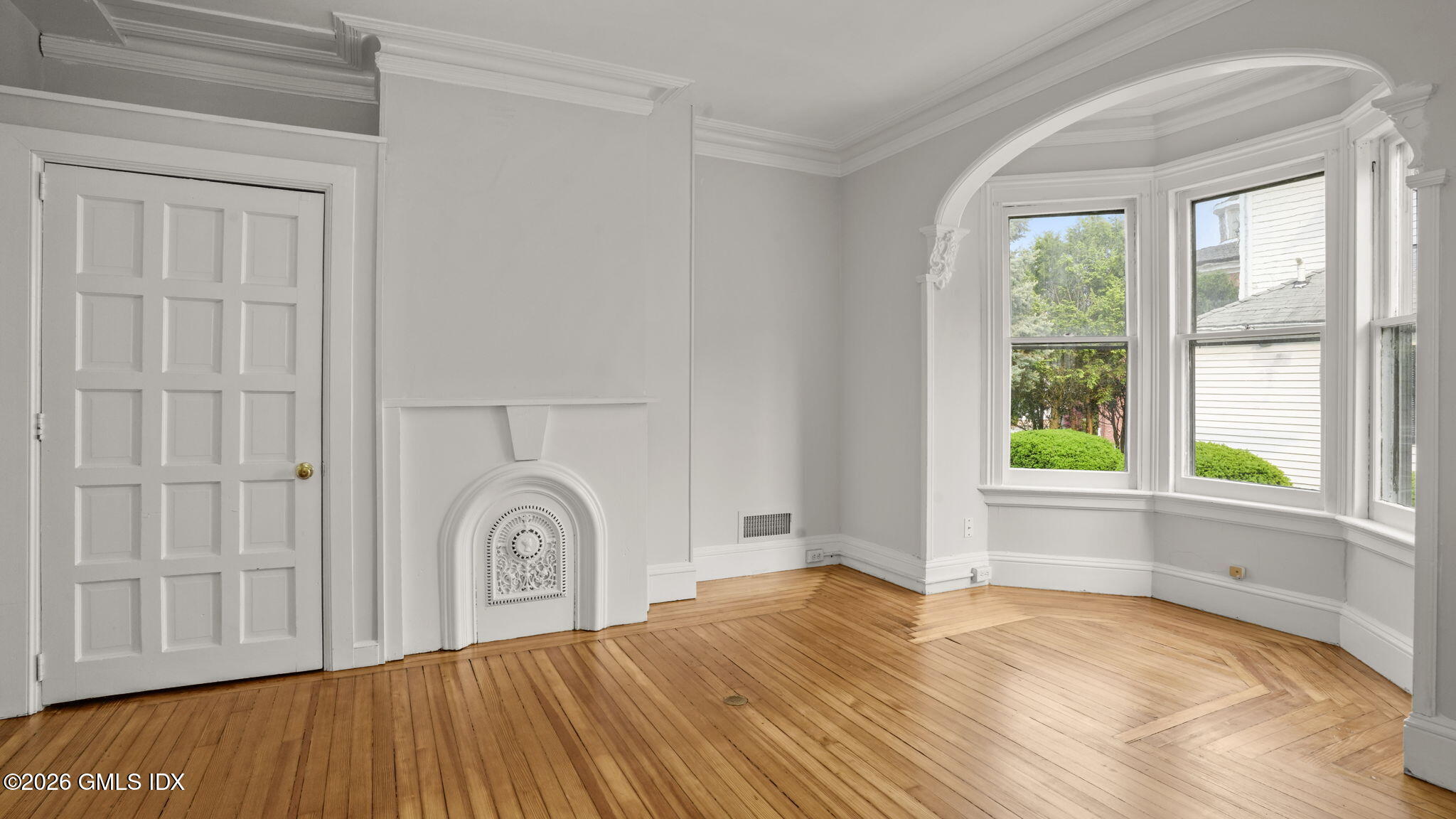 43 Church Street, Unit 1 Greenwich, CT 06830 - Photo 11 of 17 a view of empty room with window and front door