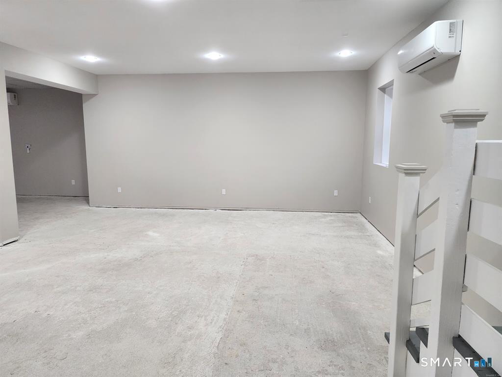 16 Church Street Voluntown, CT 06384 - Photo 12 of 12 an empty room with a bathroom