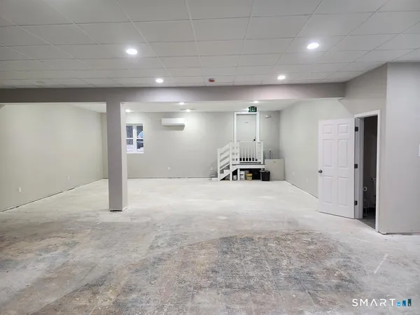 a view of a big room with wooden floors