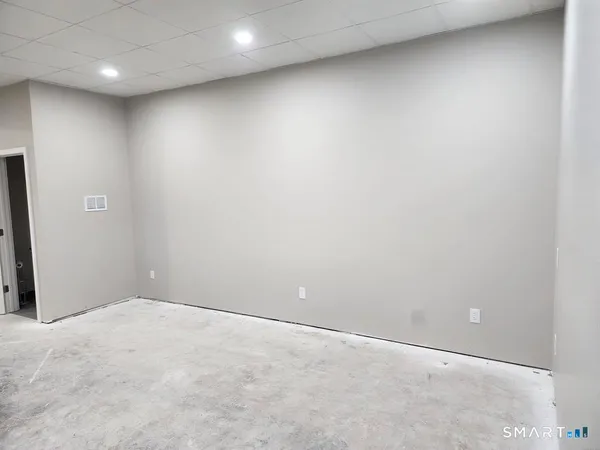 an empty room with a workbench
