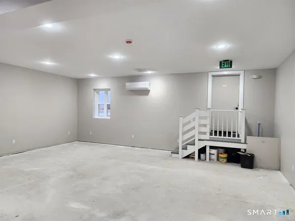 an empty room with a table and a chair