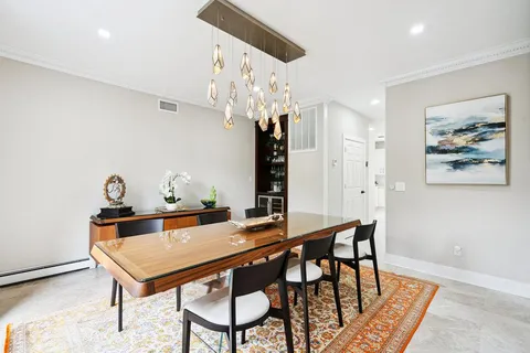 a room with furniture and wooden floor