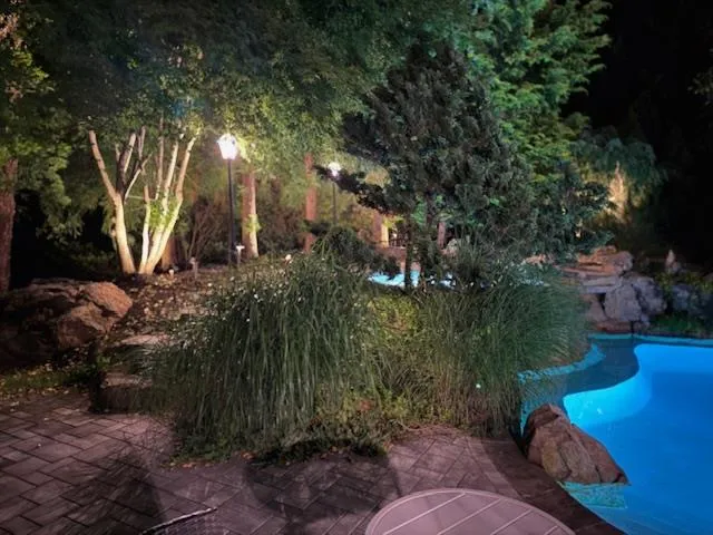 a backyard of a house with lots of green space