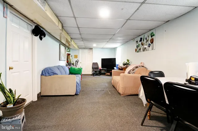 a living room with furniture and a couch