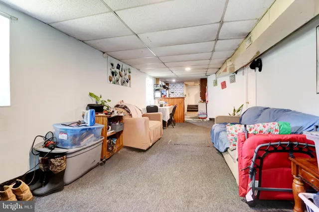 a bed room with furniture and a couch