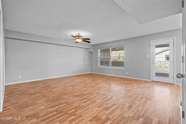 a view of a bathroom with a glass shower door