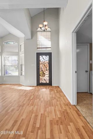 a view of an empty room and window
