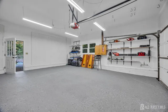 a bedroom with furniture and window