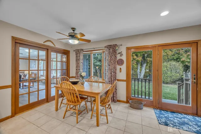 a workspace with furniture and window
