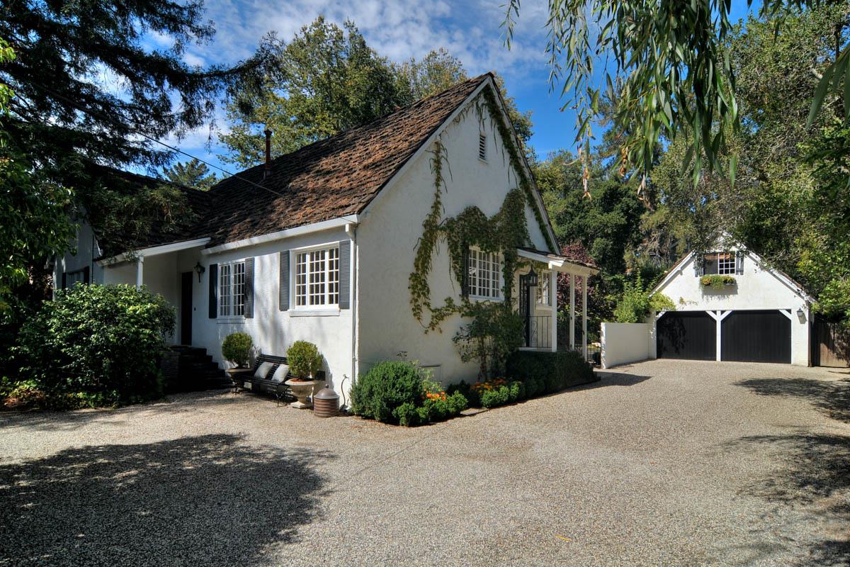 3210 Woodside Road Woodside, CA 94062 - Photo 1 of 1 a view of a house with a yard and potted plants