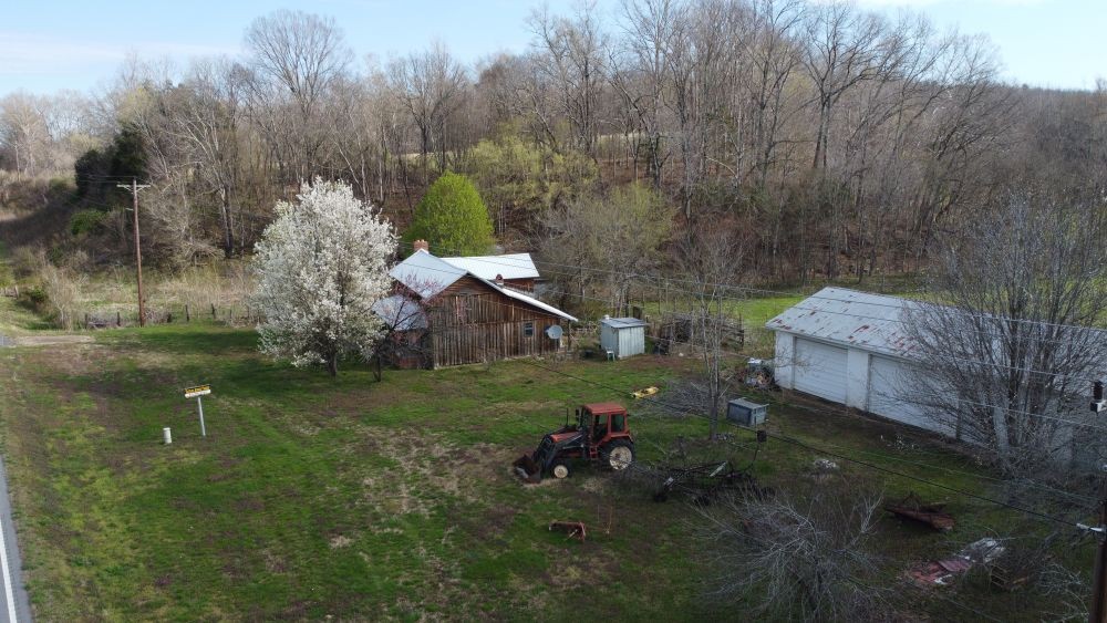 295 State Highway 48 Centerville, TN 37033 - Photo 27 of 80 a view of a house with a yard