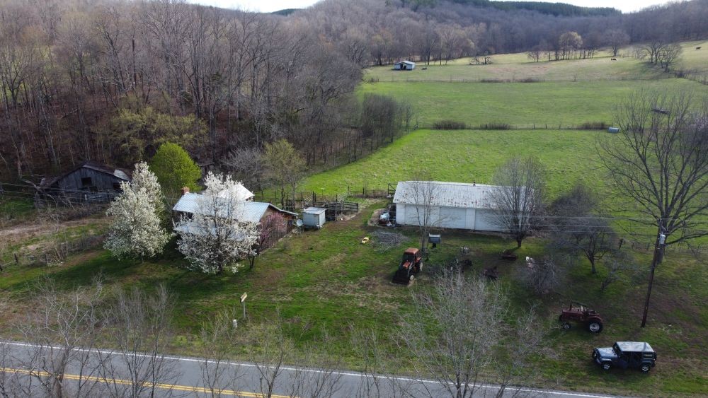 295 State Highway 48 Centerville, TN 37033 - Photo 67 of 80 a backyard of a house with lots of green space