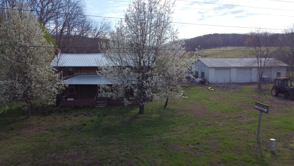 295 State Highway 48 Centerville, TN 37033 - Photo 73 of 80 a view of a house with a backyard
