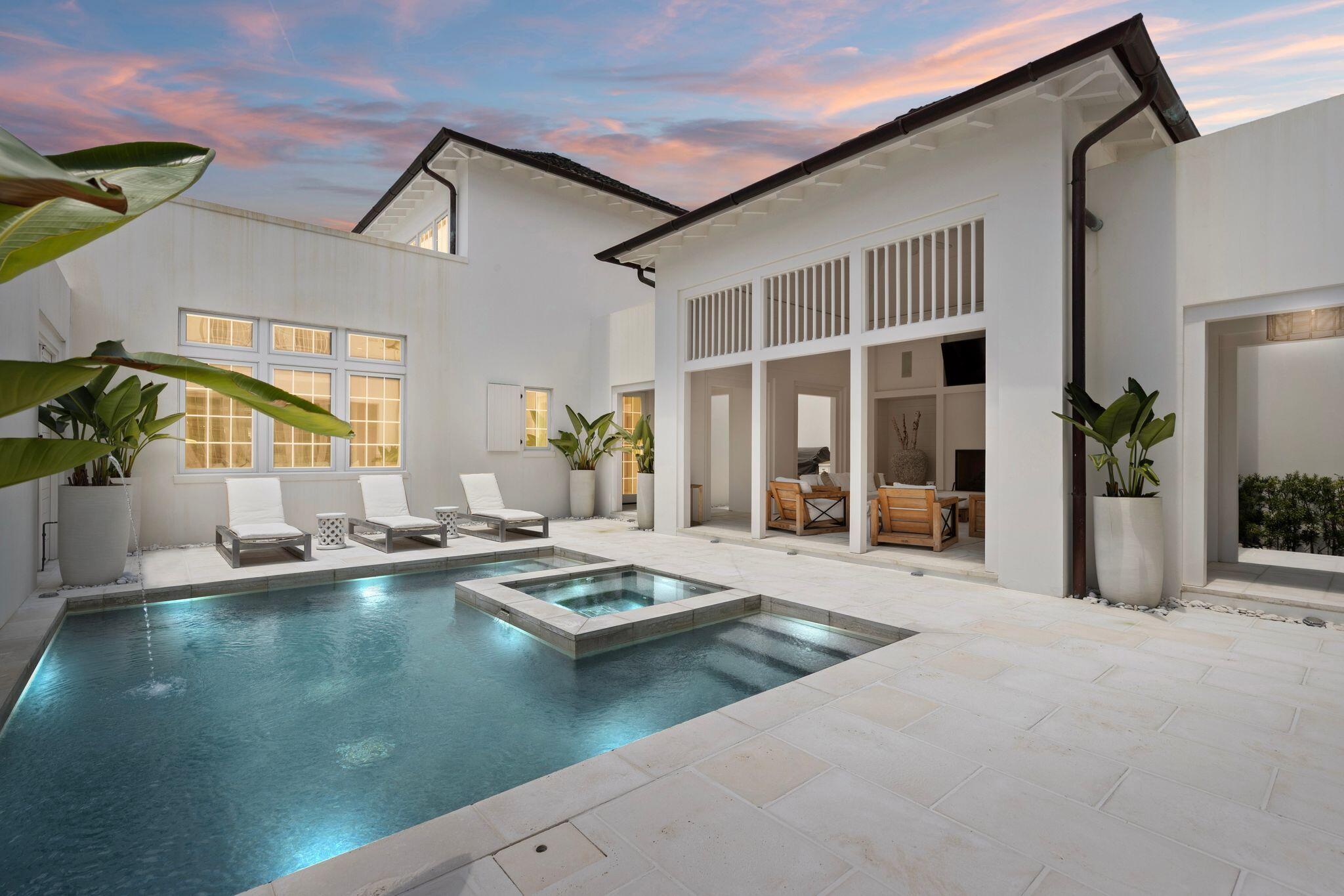 89 Kaiya Avenue Inlet Beach, FL 32461 - Photo 25 of 82 a view of a house with swimming pool and sitting area