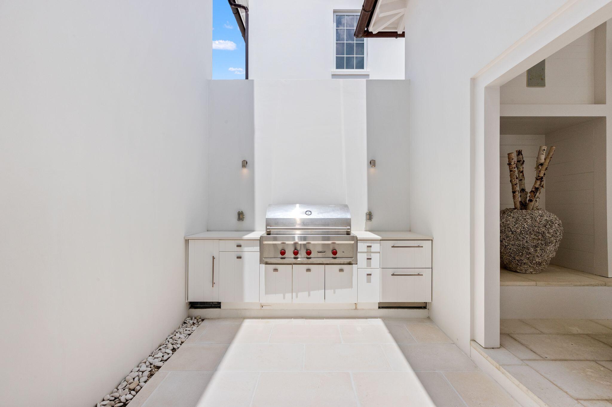 89 Kaiya Avenue Inlet Beach, FL 32461 - Photo 29 of 82 a bathroom with a sink and a mirror