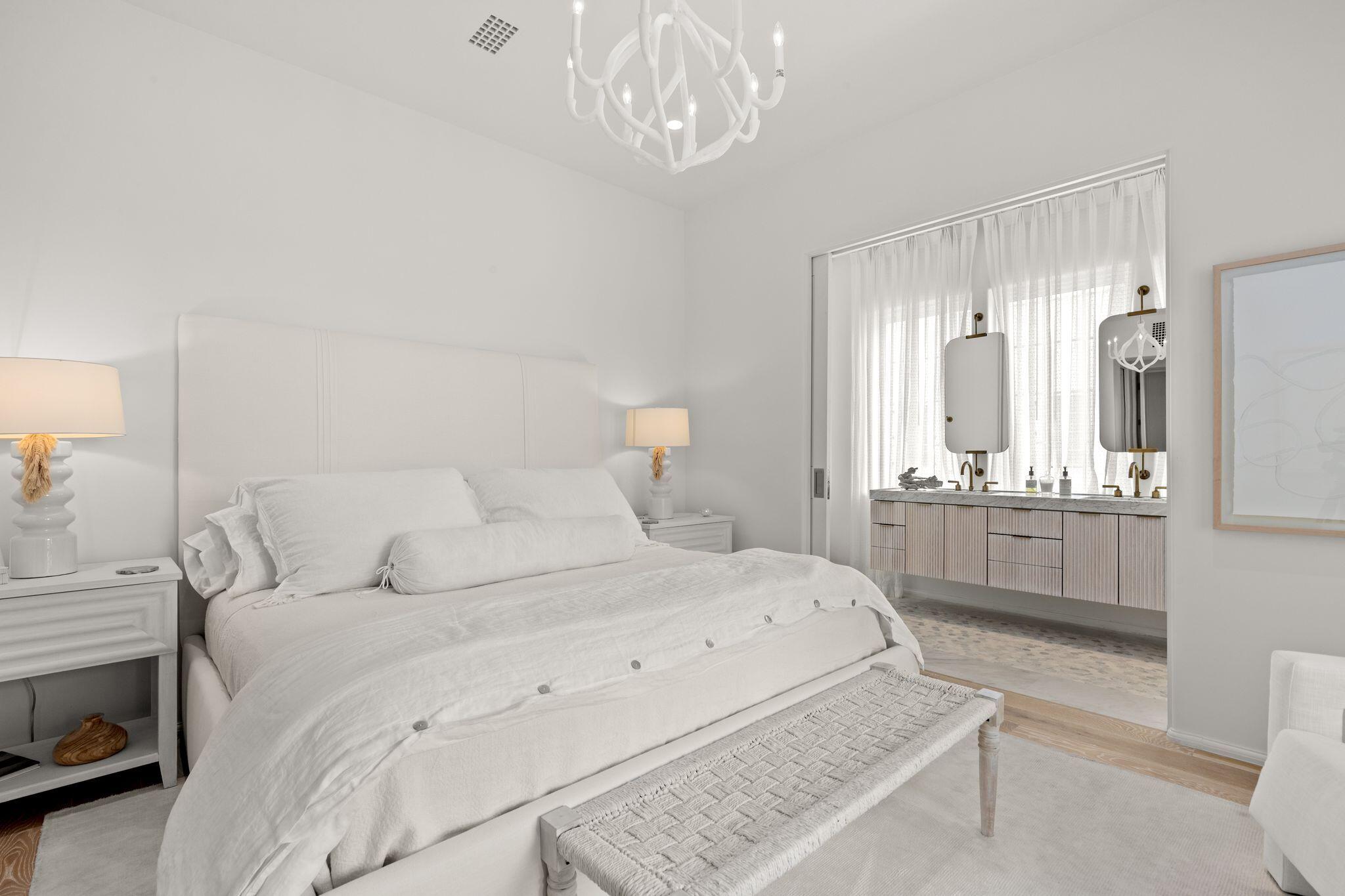 89 Kaiya Avenue Inlet Beach, FL 32461 - Photo 45 of 82 a bedroom with a bed and a large mirror