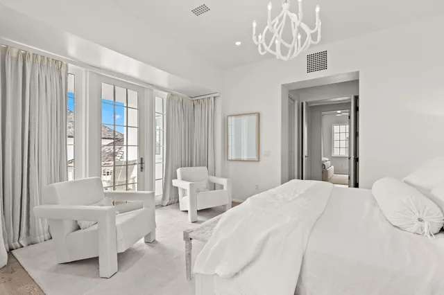 a view of a house with a flower garden