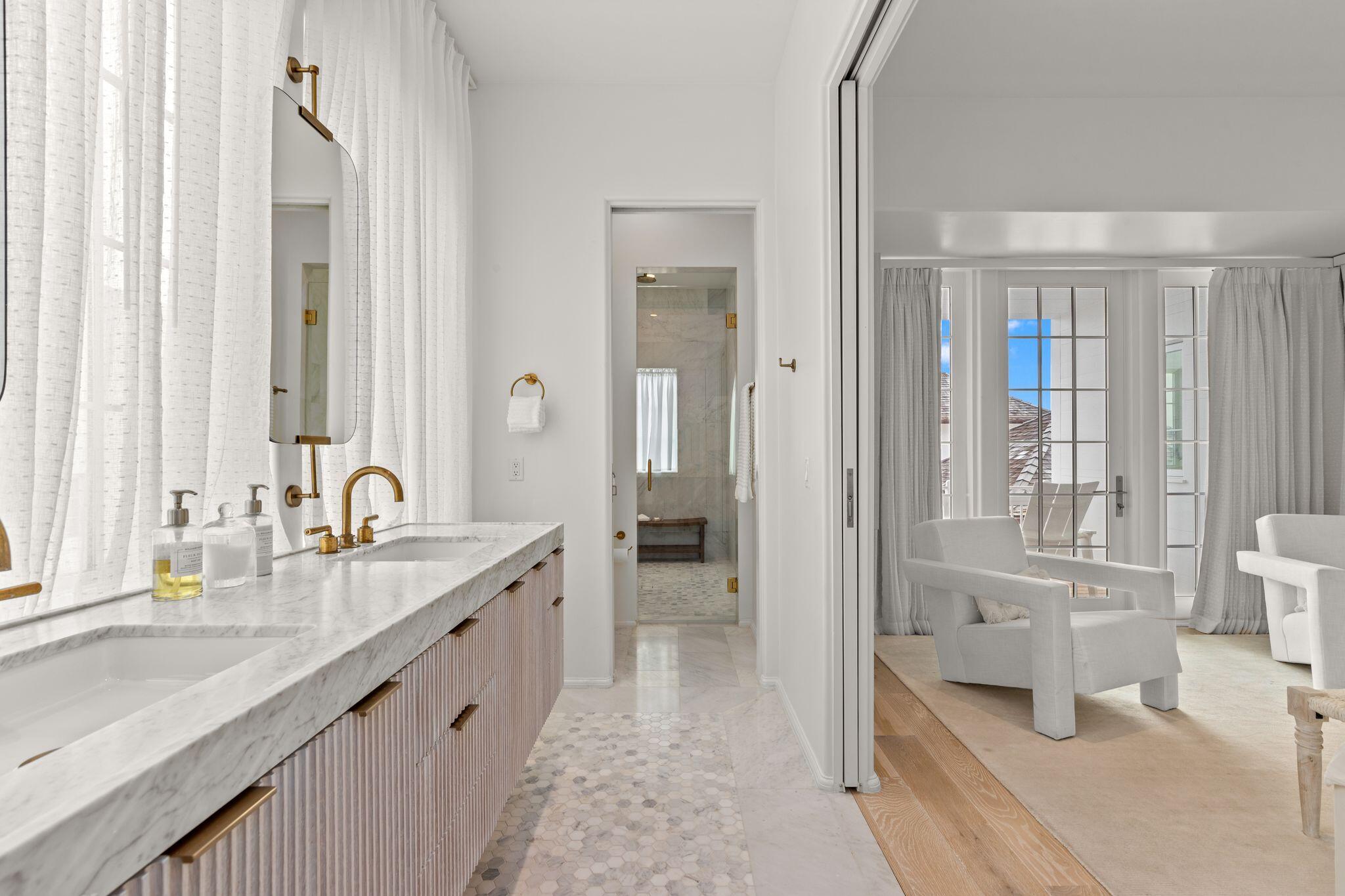 89 Kaiya Avenue Inlet Beach, FL 32461 - Photo 49 of 82 a spacious en suite bathroom with a granite countertop sink mirror and a bathtub